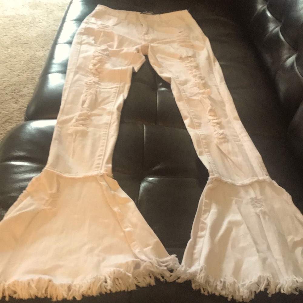 Size large cut up stretchy jeans.